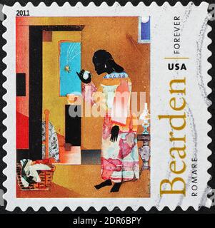 Painting by Romare Bearden on postage stamp Stock Photo