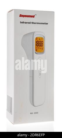 Winneconne, WI -17 December 2020: A package of Dayoumed infrared thermometer on an isolated background. Stock Photo