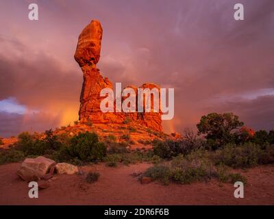 Balanced Rock is one of the most popular features of Arches National Park, situated in Grand County, Utah, United States. The total height of Balanced Stock Photo