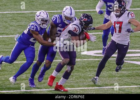 Indianapolis, Indiana, USA. 20th Dec, 2020. Houston Texans running back David Johnson (31) is tackled by Indianapolis Colts outside linebacker Darius Leonard (53) in the game between the Houston Texans and the Indianapolis Colts at Lucas Oil Stadium, Indianapolis, Indiana. Credit: Scott Stuart/ZUMA Wire/Alamy Live News Stock Photo