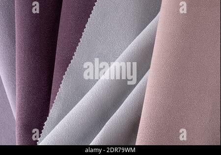 Light Lilac and Pink colors velour textile samples. Fabric texture background Stock Photo