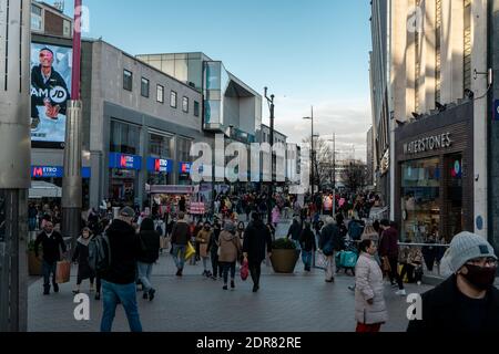 Birmingham, United Kingdom - December 12 2020: Christmas shoppers outside Birmingham Bullring shopping centre during Covid-19 pandemic Stock Photo