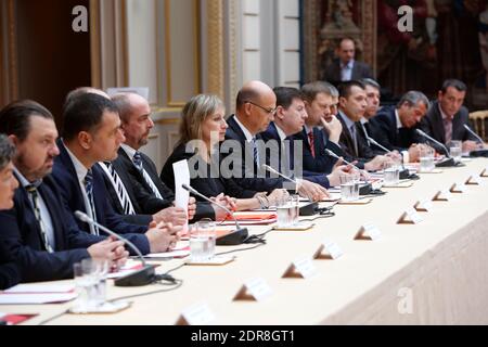 French President Francois Hollande along with Minister of the Interior Bernard Cazeneuve receive representatives of the police trade unions at the Elysee Palace in Paris, France on October 22, 2015. Photo by Nicolas Tavernier/Pool/ABACAPRESS.COM Stock Photo
