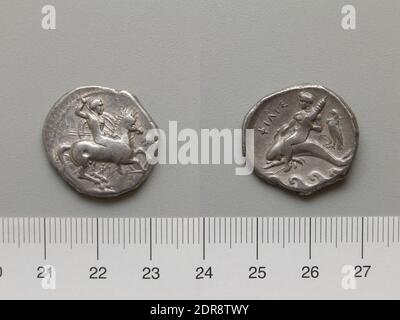 Mint: Tarentum, Nomos from Tarentum, 332–302 B.C., Silver, 7.63 g, 9:00, 6 mm, Made in Tarentum, Calabria, Greek, 4th century B.C., Numismatics Stock Photo