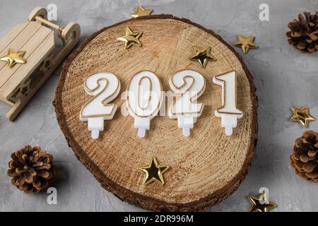 2021 on wooden and gray with stars background Stock Photo