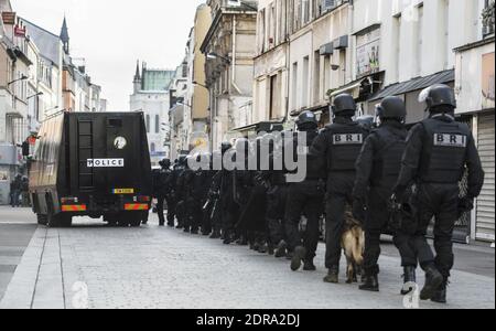 This handout picture dated November 18, 2015 shows the French police special forces RAID (Research, Assistance, Intervention, Deterrence) and BRI (Research and Intervention Brigades) during a raid in an apartment in Saint Denis, North of Paris, during an operation aimed at capturing suspected mastermind of the Paris attacks, Belgian Abdelhamid Abaaoud. Five were arrested and three died, among which Abaaoud. Photo by Francis Pellier/MI/DICOM/ABACAPRESS.COM Stock Photo