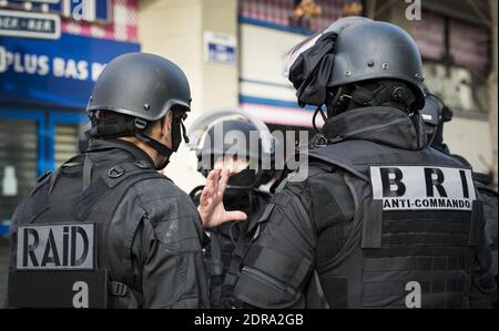 This handout picture dated November 18, 2015 shows the French police special forces RAID (Research, Assistance, Intervention, Deterrence) and BRI (Research and Intervention Brigades) during a raid in an apartment in Saint Denis, North of Paris, during an operation aimed at capturing suspected mastermind of the Paris attacks, Belgian Abdelhamid Abaaoud. Five were arrested and three died, among which Abaaoud. Photo by Francis Pellier/MI/DICOM/ABACAPRESS.COM Stock Photo