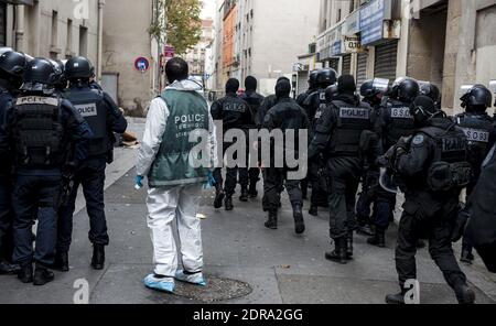 This handout picture dated November 18, 2015 shows the French police special forces RAID (Research, Assistance, Intervention, Deterrence) and BRI (Research and Intervention Brigades) during a raid in an apartment in Saint Denis, North of Paris, during an operation aimed at capturing suspected mastermind of the Paris attacks, Belgian Abdelhamid Abaaoud. Five were arrested and three died, among which Abaaoud. Photo by Jerome Groisard/MI/DICOM/ABACAPRESS.COM Stock Photo