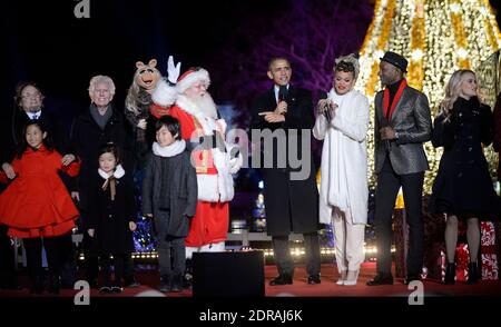 The President Barack Obama and (L-R) Crosby, Stills & Nash, Miss Piggy, Santa Claus,Andra Day, Aloe Blacc and Reese Witherspoon look on from the stage during the national Christmas tree lighting ceremony on the Ellipse south of the White House December 3, 2015 in Washington, DC. The lighting of the tree is an annual tradition attended by the president and the first family. Photo by Olivier Douliery/Pool/ABACAPRESS.COM Stock Photo