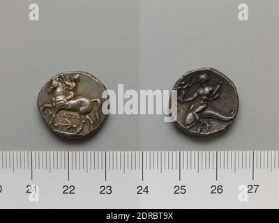 Mint: Tarentum, Nomos from Tarentum, 272–240 B.C., Silver, 6.33 g, 18.5 mm, Made in Tarentum, Calabria, Greek, 3rd century B.C., Numismatics Stock Photo