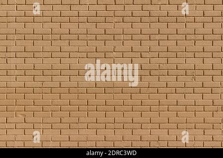 Full frame texture background of a textured beige painted exterior brick wall surface with a mild grungy look for normal weathering Stock Photo