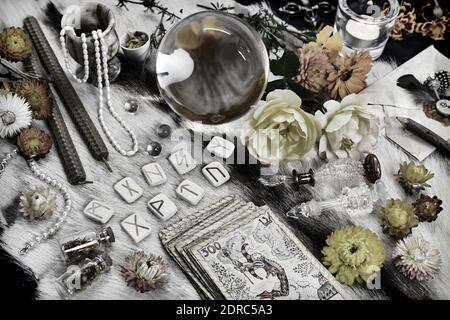 Dried plants, herbs and yellow rose flower petals in a grey, dirty clay  pot. Wiccan witch altar with ingredients on it ready to make cast a spell  Stock Photo - Alamy