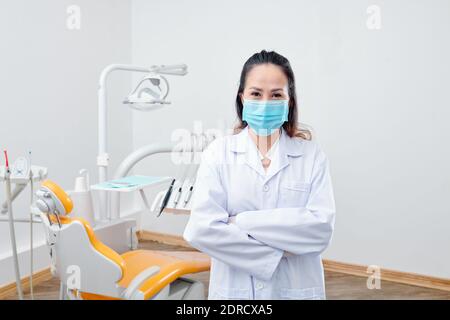 Mature Asian female dentist Stock Photo