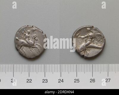 Mint: Tarentum, Nomos from Tarentum, 302–280 B.C., Silver, 7.75 g, 3:00, 22 mm, Made in Tarentum, Calabria, Greek, 3rd century B.C., Numismatics Stock Photo