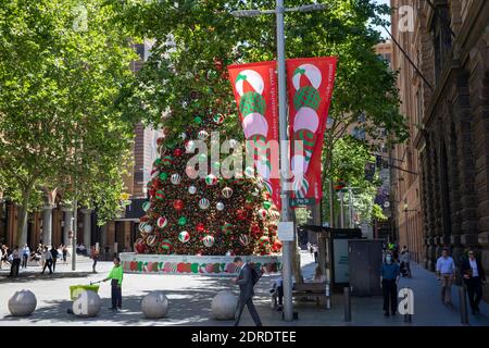 Giant Christmas tree and Christmas banners in Martin place in Sydney city centre,NSW,Australia Stock Photo