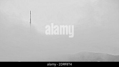 Mt Kaukau, Wellington NZ, a TV tower on a low cloud day Stock Photo