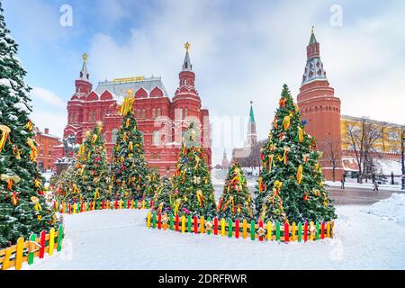 Christmas trees near kremlin in Moscow at winter snowy day, Russia Stock Photo