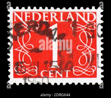 MOSCOW, RUSSIA - FEBRUARY 10, 2019: A stamp printed in Netherlands shows Numeral, Numbers serie, circa 1946 Stock Photo