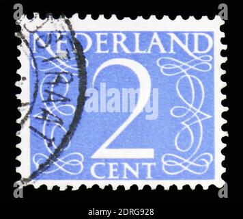 MOSCOW, RUSSIA - FEBRUARY 10, 2019: A stamp printed in Netherlands shows Numeral, Numbers serie, circa 1946 Stock Photo