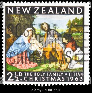 MOSCOW, RUSSIA - FEBRUARY 10, 2019: A stamp printed in New Zealand shows Holy Family with sheperds, painting by Titian,  Christmas serie, circa 1963 Stock Photo