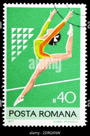ROMANIA CIRCA 1977 Stamp Printed By Romania Shows Woman Spinning ROMANIA CIRCA 1977 Stamp Printed By Romania Shows Woman Spinning