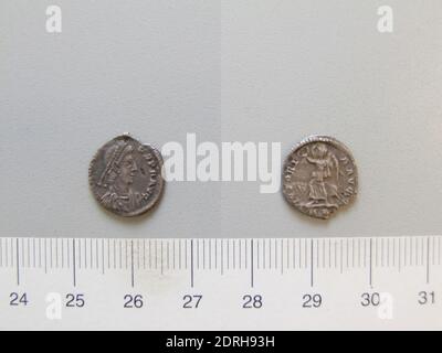 Ruler: Honorius, Flavius, Emperor of Rome, A.D. 384–423, ruled 393–423, Mint: Rome, 1/2 Siliqua of Honorius, Flavius, Emperor of Rome from Rome, 404–8, Silver, 0.99 g, 6:00, 14 mm, Made in Rome, Roman, 5th century A.D., Numismatics Stock Photo