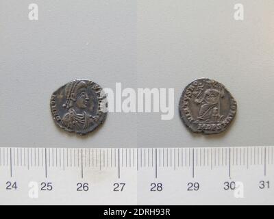 Ruler: Honorius, Flavius, Emperor of Rome, A.D. 384–423, ruled 393–423, Mint: Constantinople, 1 Siliqua of Honorius, Flavius, Emperor of Rome from Constantinople, 395–402, Silver, 1.26 g, 11:00, 15.5 mm, Made in Constantinople, Roman, 4th–5th century A.D., Numismatics Stock Photo