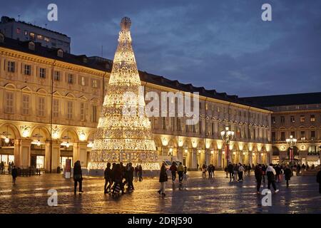 Piazza San Carlo illuminated on Christmas days at nightfall, Turin, Italy - December 2020 Stock Photo