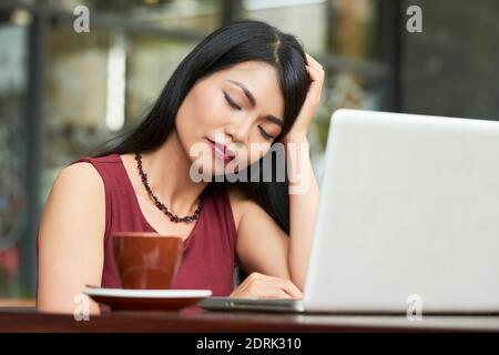 Exhausted businesswoman Stock Photo