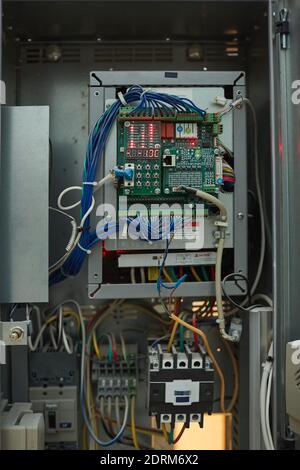 Background image of open electrical switchboard or security system board inside HUB, copy space Stock Photo