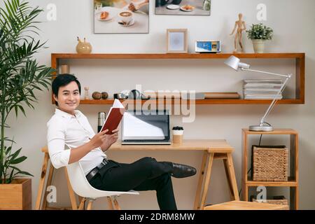 Successful young Asian businessman Stock Photo