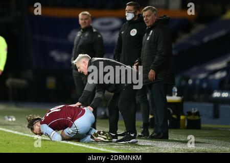 Sammy Lee, the West Bromwich Albion assistant coach checks on Jack Grealish of Aston Villa after he is fouled by Jake Livermore who gets a red card for the tackle. Premier League, West Bromwich Albion v Aston Villa at the Hawthorns in West Bromwich, Midlands on Sunday 20th December 2020. this image may only be used for Editorial purposes. Editorial use only, license required for commercial use. No use in betting, games or a single club/league/player publications. pic by Andrew Orchard/Andrew Orchard sports photography/Alamy Live news