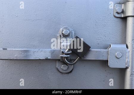 An industrial intermodal shipping container locked door for Security during shipping Stock Photo