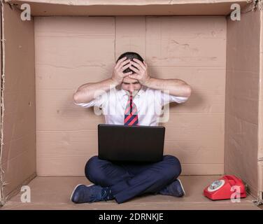 surprised businessman reading amazing information on his laptop Stock Photo