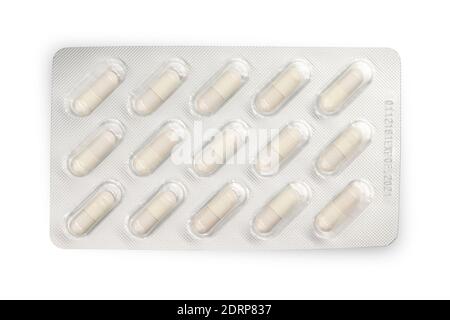 Top view of pills in a blister pack isolated on white background Stock Photo