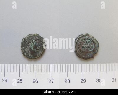 Ruler: Constantius II, Emperor of Rome, A.D. 317–361, ruled A.D. 337–61, Mint: Antioch, 1 Nummus of Constantius II, Emperor of Rome from Antioch, 347–48, Argentiferous bronze, 1.50 g, 12:00, 16 mm, Made in Antioch, Roman, 4th century, Numismatics Stock Photo