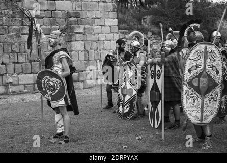 MERIDA, SPAIN - Sep 27, 2014: Several people dressed in costume of ancient Celtic warrior in the first century, participates in historical reenactment Stock Photo