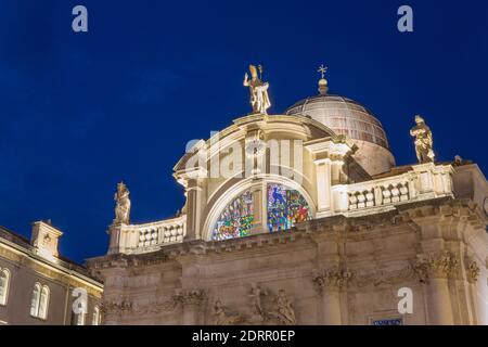 Dubrovnik, Dubrovnik-Neretva, Croatia. Illuminated baroque façade and dome of St Blaise's Church, dusk. Stock Photo