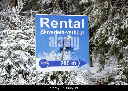 Winterberg, Sauerland, North Rhine-Westphalia, Germany - Snowed sign ski rental, sign in Dutch language for the many Dutch ski tourists, no winter spo Stock Photo