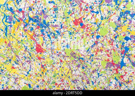 Multi-colored splashes of paint on the wall. Colored background. Stock Photo