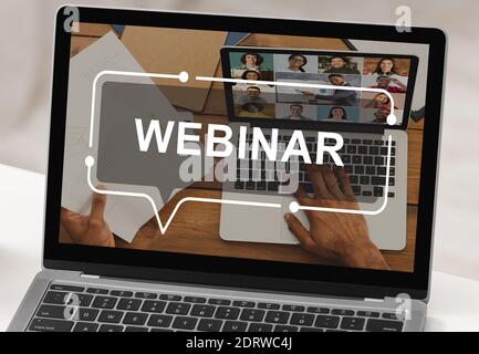 Laptop with webinar inscription on screen, creative image Stock Photo
