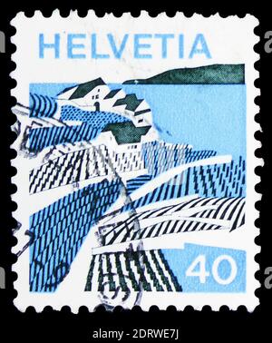 MOSCOW, RUSSIA - FEBRUARY 10, 2019: A stamp printed in Switzerland shows Riex (Waadt), Landscapes serie, circa 1973 Stock Photo