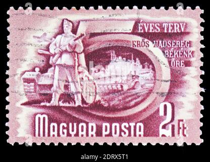 MOSCOW, RUSSIA - FEBRUARY 10, 2019: A stamp printed in Hungary shows Army, Five-Year Plan serie, circa 1950 Stock Photo