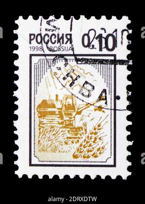 MOSCOW, RUSSIA - FEBRUARY 14, 2019: A stamp printed in Russia shows Harvester, 3rd Definitive Issue serie, circa 1998 Stock Photo