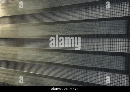 Example of moiré pattern in roller blinds with very fine rectangles. Pattern is caused by wave interference or diffraction. Stock Photo