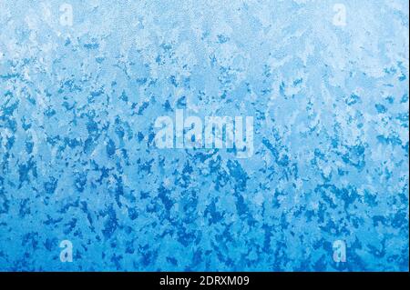 Close-up of frost crystals form patterns on a window pane Stock Photo