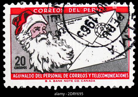 MOSCOW, RUSSIA - FEBRUARY 20, 2019: A stamp printed in Peru shows Santa Claus, Christmas serie, circa 1965 Stock Photo