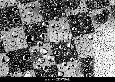 abstract selective focus background on chess theme. water bubbles multiple reflections. Stock Photo
