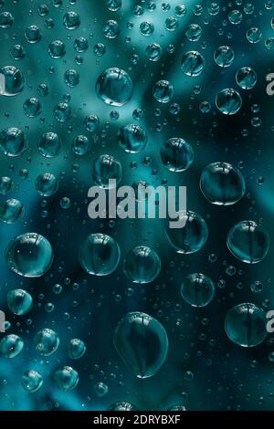 abstract selective focus colorful background with water drops. water bubbles multiple reflections. Stock Photo