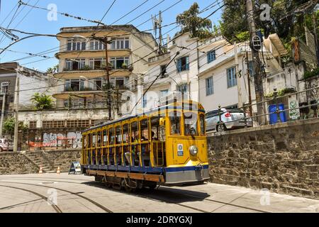 Rio de Janeiro, Brazil - November 16, 2016: Tourists ride the new version of the iconic bonde tram in the heart of the Santa Teresa neighborhood. Stock Photo